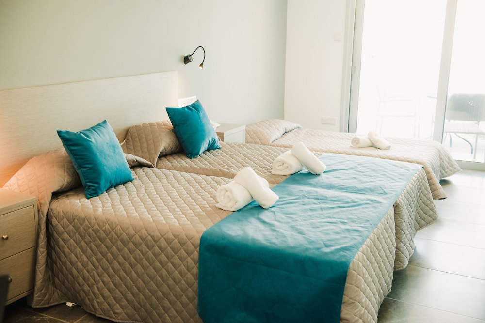 A. MAOS HOTEL APARTMENTS